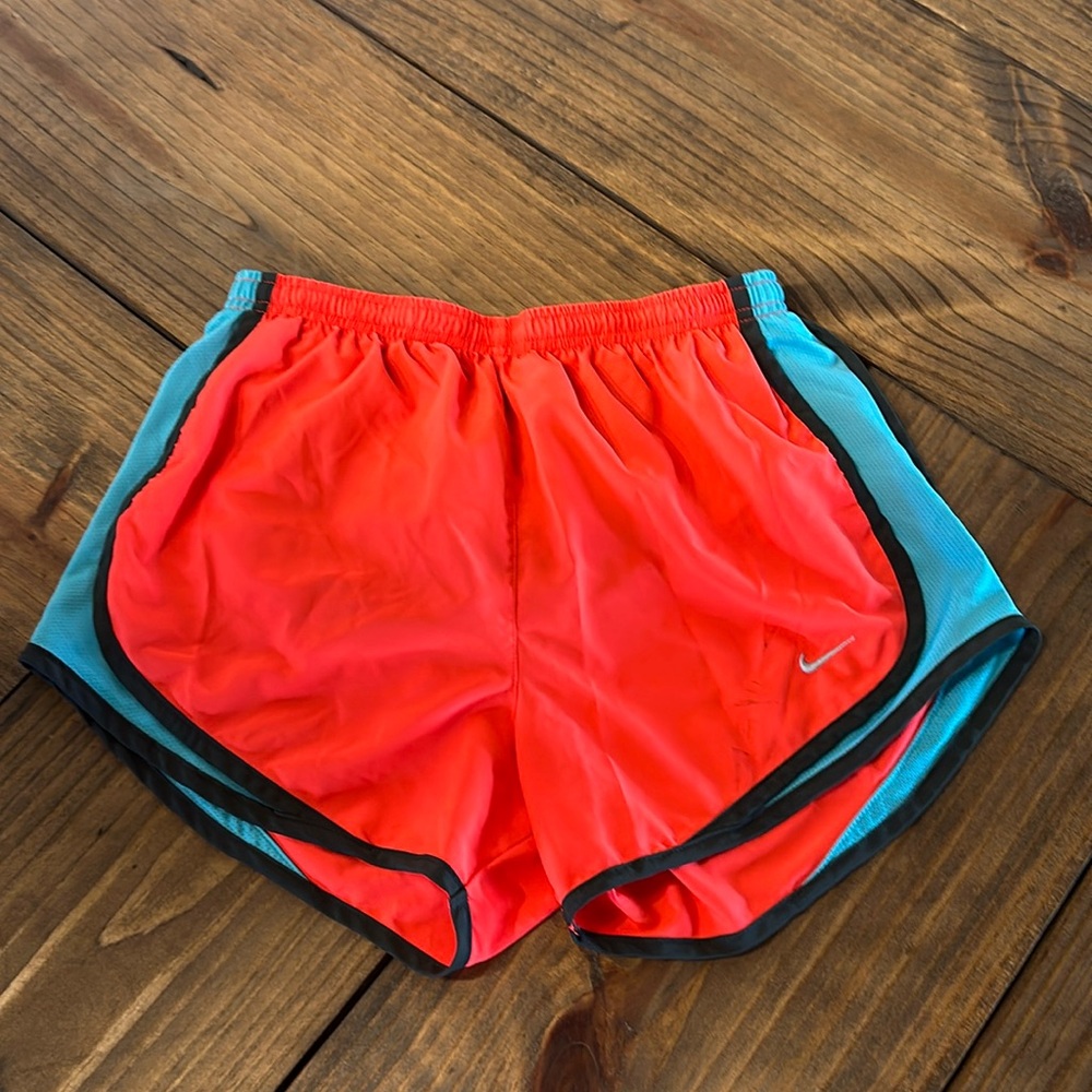 Small orange Nike running shorts